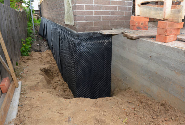 Happy homeowners after waterproofing job in Oceanport
